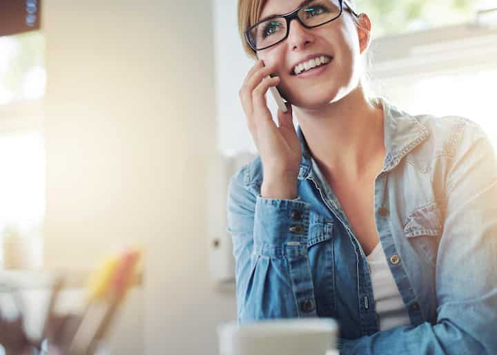 A woman calling a water damage repair experts in Hilliard, OH